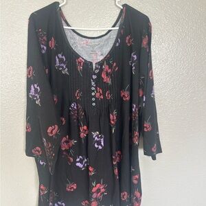 Woman Within Black Floral Tunic with Red and Purple Flowers